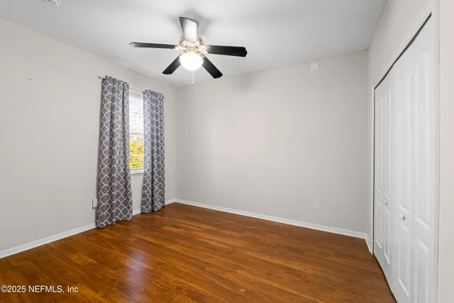a view of a swimming pool with a lake view