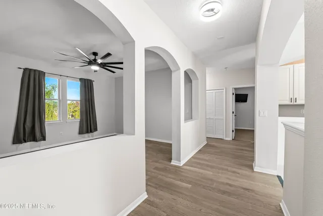 a view of a swimming pool with a porch