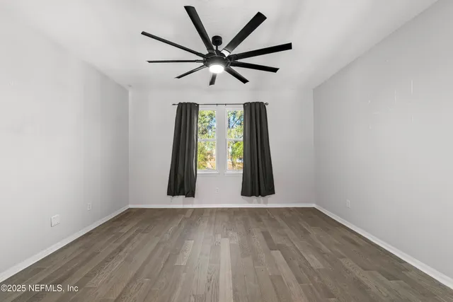 a view of a swimming pool with a porch