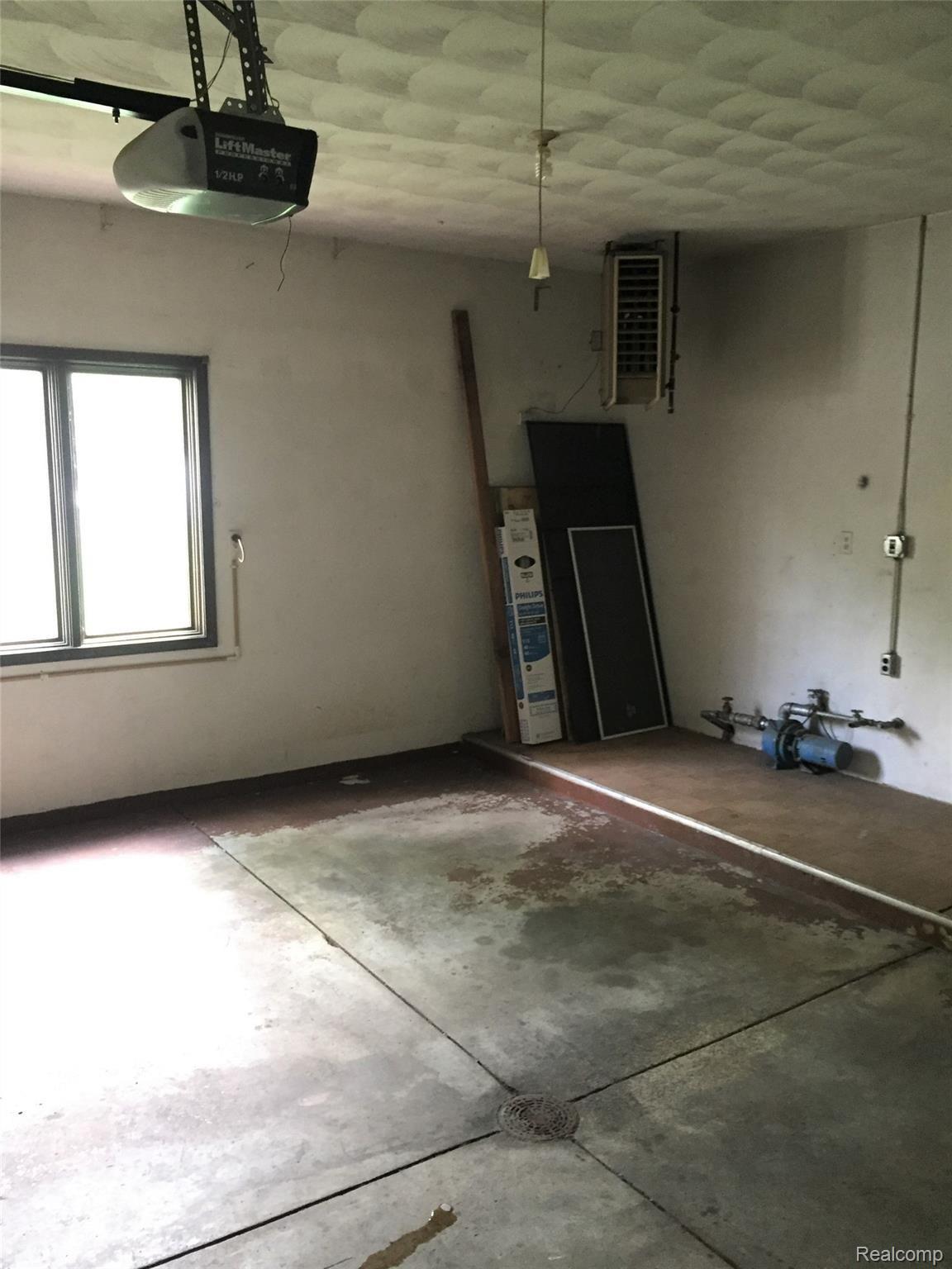 11121 Messmore Road Utica, MI 48317 - Photo 20 of 34 garage interior and heater.jpg