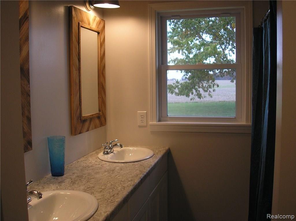 6285 Sanilac Road Kingston, MI 48741 - Photo 7 of 9 Second bath with all new fixtures, tub and ceramic flooring.