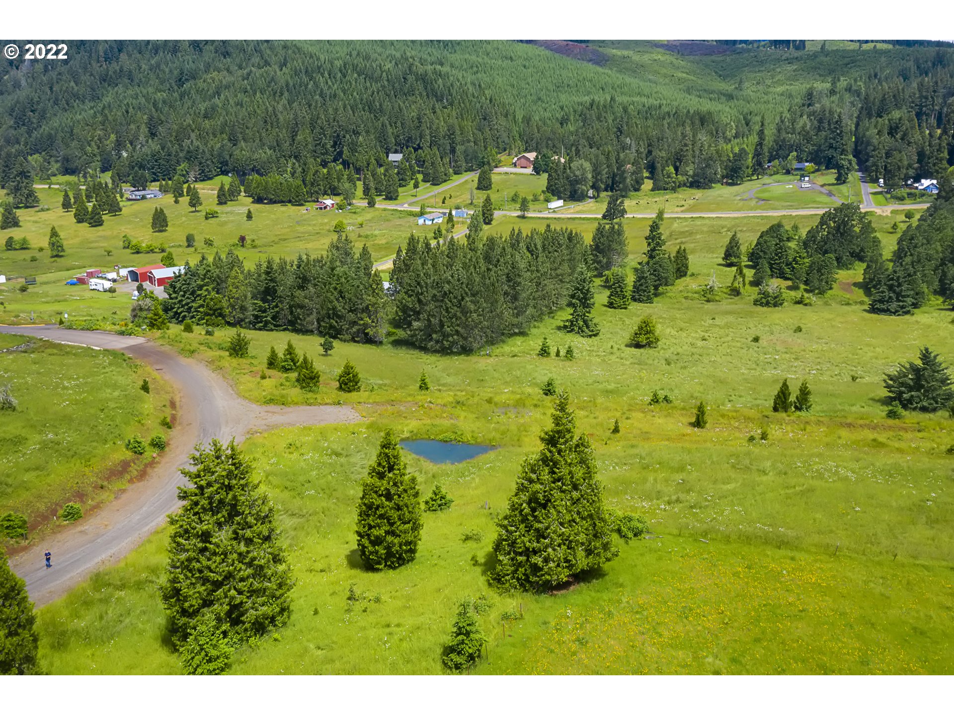 0 Bugle Loop Oakridge, OR 97463 - Photo 13 of 14 a view of a lake with houses