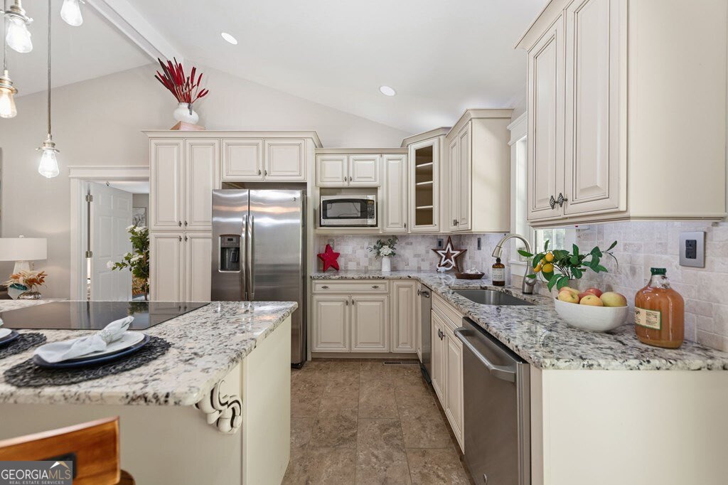 224 Timber Ridge Lane Ellijay, GA 30540 - Photo 24 of 61 a kitchen with a sink stove and refrigerator