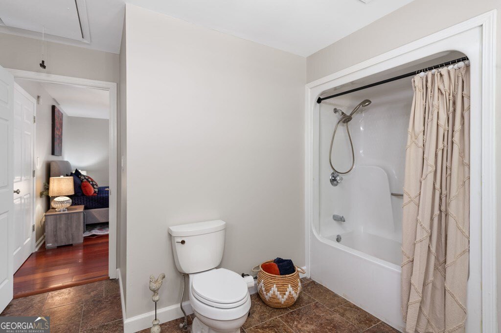 224 Timber Ridge Lane Ellijay, GA 30540 - Photo 38 of 61 a bathroom with a toilet sink and shower