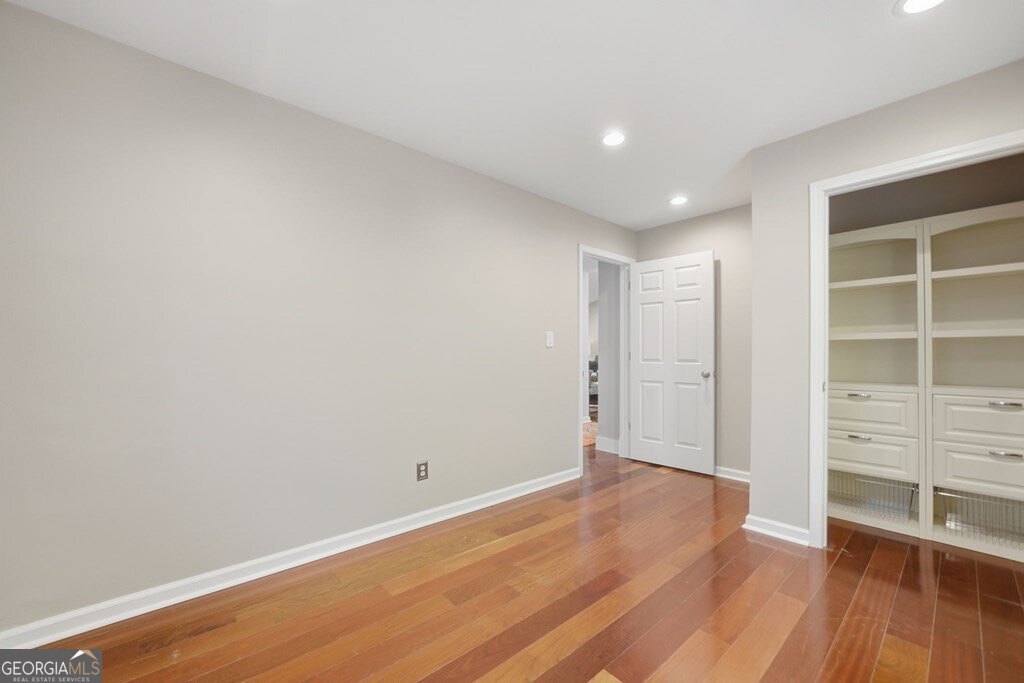 224 Timber Ridge Lane Ellijay, GA 30540 - Photo 45 of 61 a view of a room with wooden floor and shoes