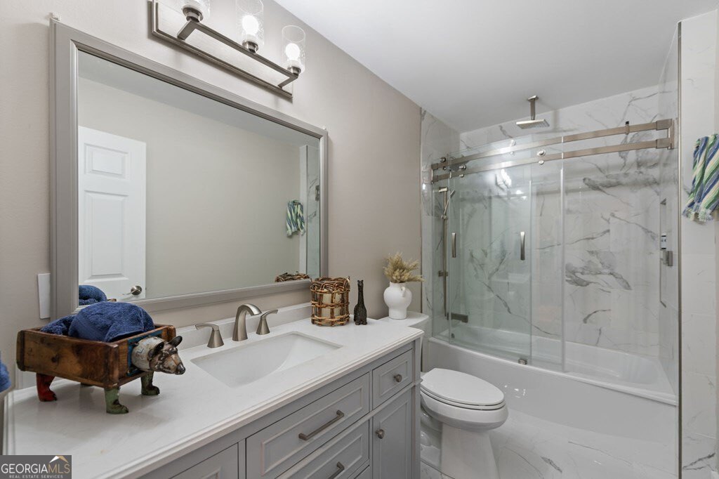 224 Timber Ridge Lane Ellijay, GA 30540 - Photo 46 of 61 a bathroom with a sink toilet and shower