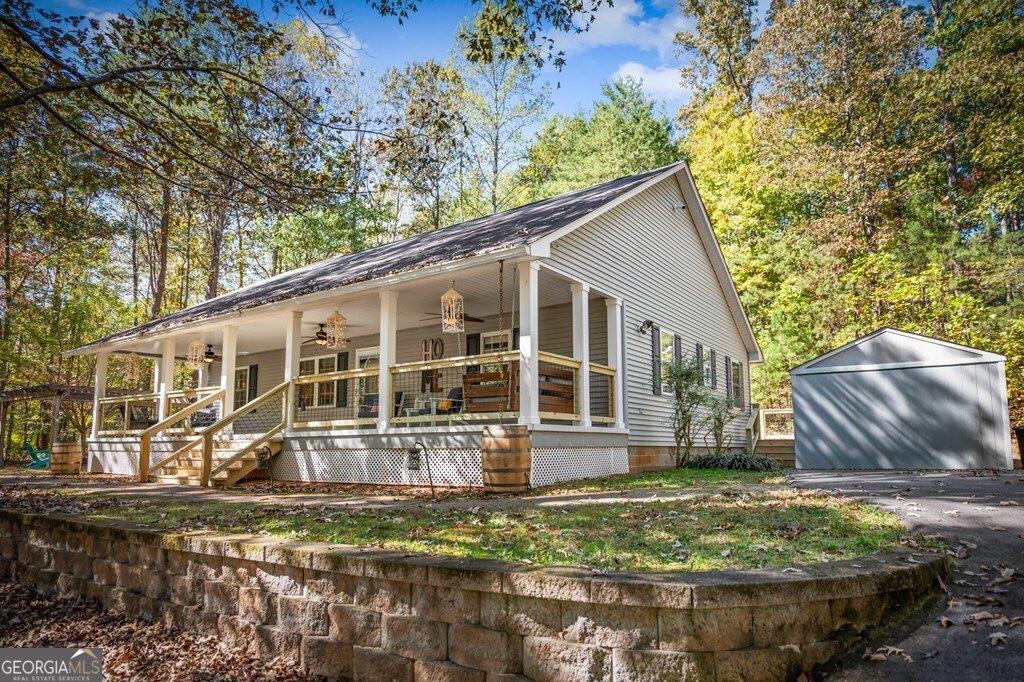 224 Timber Ridge Lane Ellijay, GA 30540 - Photo 50 of 61 front view of a house with a yard