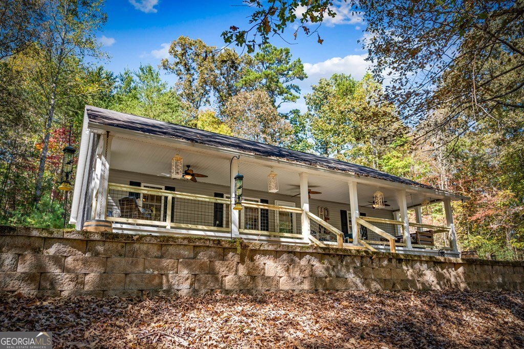224 Timber Ridge Lane Ellijay, GA 30540 - Photo 52 of 61 front view of a house with a trees