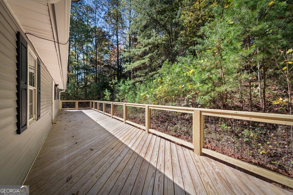224 Timber Ridge Lane Ellijay, GA 30540 - Photo 61 of 61 a view of balcony with wooden floor and fence