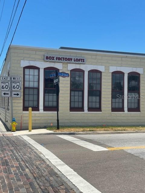 a view of a building with a street