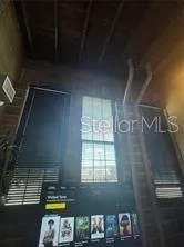 a view of walk in closet with window