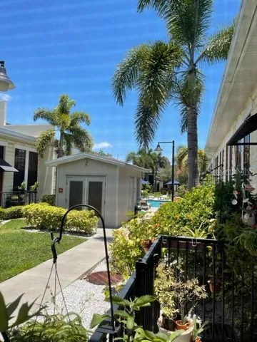 a house view with a garden space