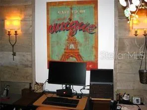 a picture of a bathroom with a sink and a mirror