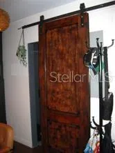 a bathroom with a shower and a mirror