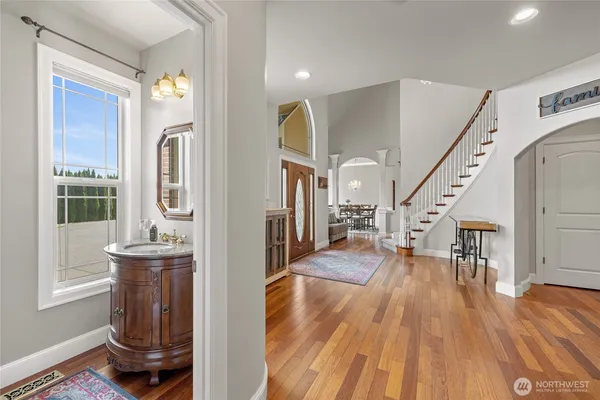 a kitchen with a sink cabinets and a window