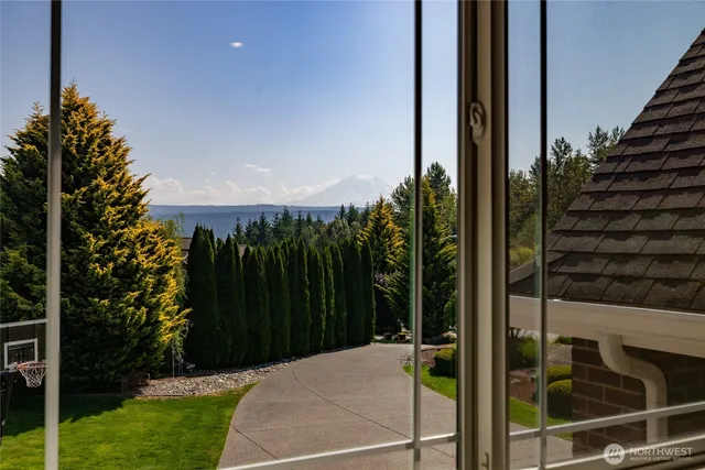a terrace with trees in front of it