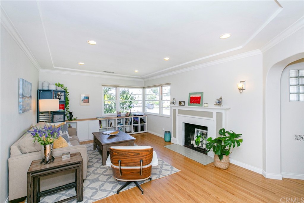 690 Arden Avenue Glendale, CA 91202 - Photo 16 of 70 a living room with furniture fireplace and a window