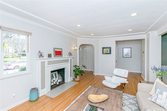 a kitchen with stainless steel appliances granite countertop a stove top oven a sink and cabinets