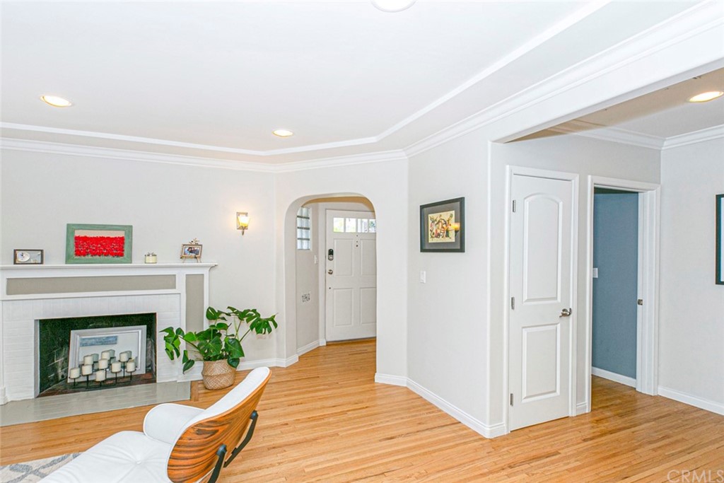 690 Arden Avenue Glendale, CA 91202 - Photo 22 of 70 a living room with furniture and a fireplace