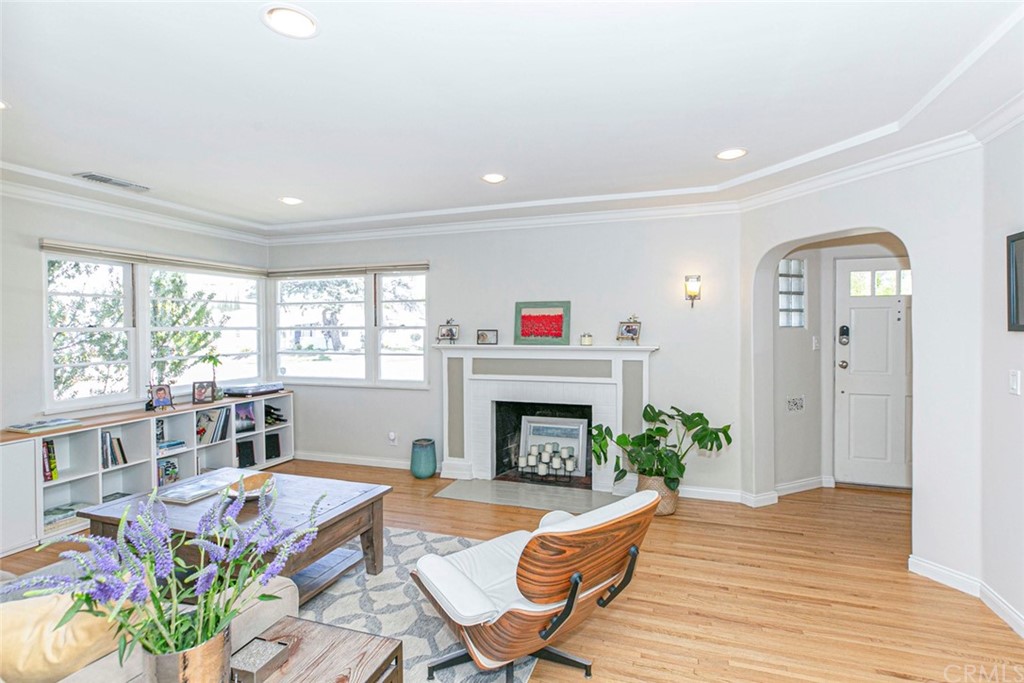 690 Arden Avenue Glendale, CA 91202 - Photo 23 of 70 a living room with furniture fireplace and potted plants