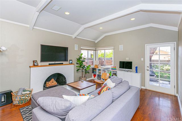 a room with a dresser and a mirror