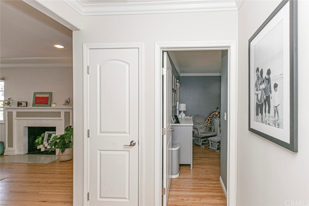690 Arden Avenue Glendale, CA 91202 - Photo 52 of 70 a view of a hallway with dining room and wooden floor