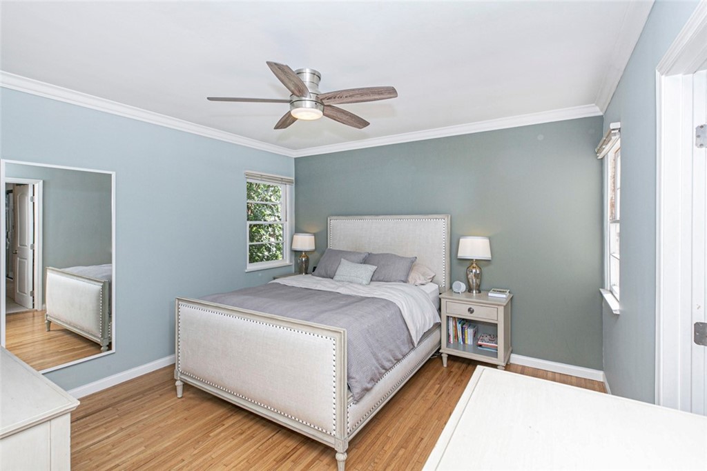 690 Arden Avenue Glendale, CA 91202 - Photo 53 of 70 a bedroom with a bed and a chandelier