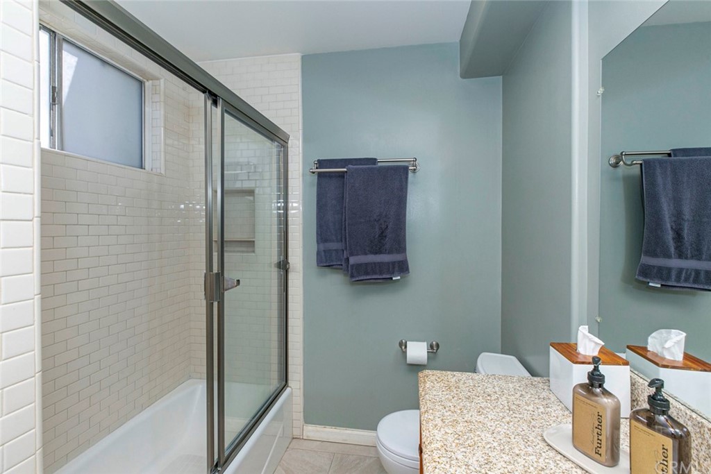 690 Arden Avenue Glendale, CA 91202 - Photo 57 of 70 a bathroom with a sink toilet and shower