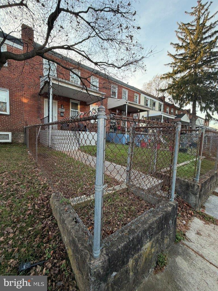 5356 Cuthbert Avenue Baltimore, MD 21215 - Photo 2 of 6 a view of a house with a yard