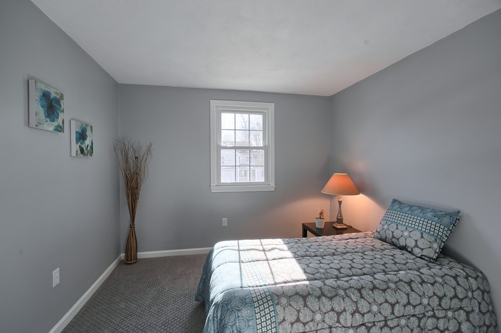 6 Campbell Road Billerica, MA 01821 - Photo 14 of 30 a bedroom with a bed and window