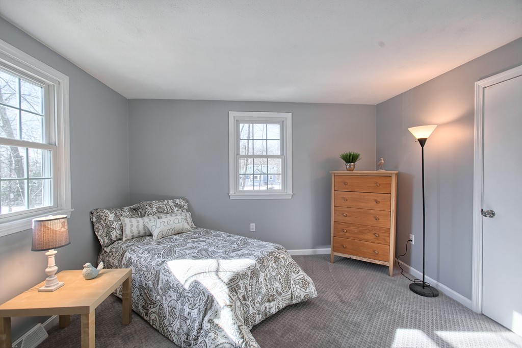 6 Campbell Road Billerica, MA 01821 - Photo 19 of 30 a bedroom with a bed and a window