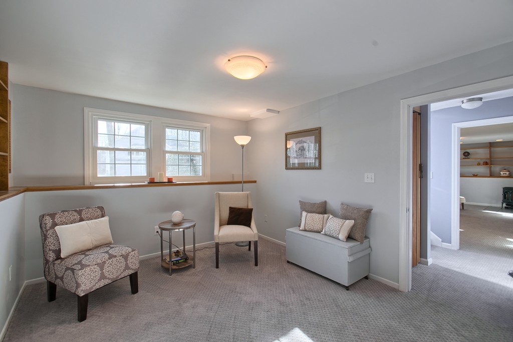 6 Campbell Road Billerica, MA 01821 - Photo 21 of 30 a living room with furniture and a potted plant