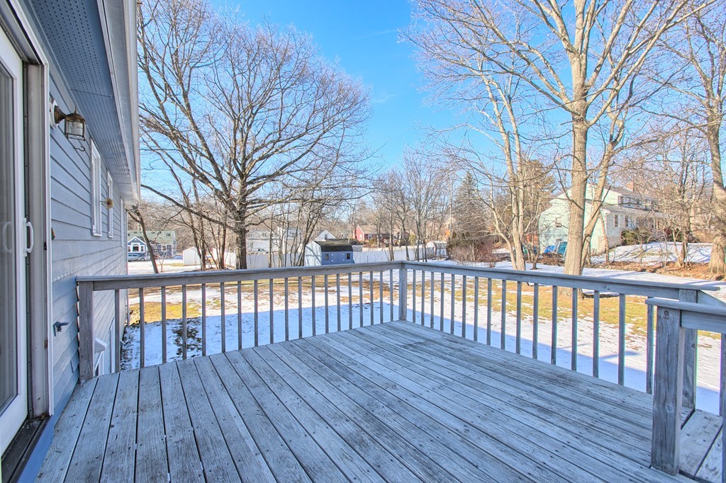 6 Campbell Road Billerica, MA 01821 - Photo 3 of 30 a view of a wooden deck