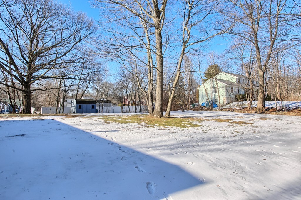 6 Campbell Road Billerica, MA 01821 - Photo 4 of 30 a view of road with snow on the road