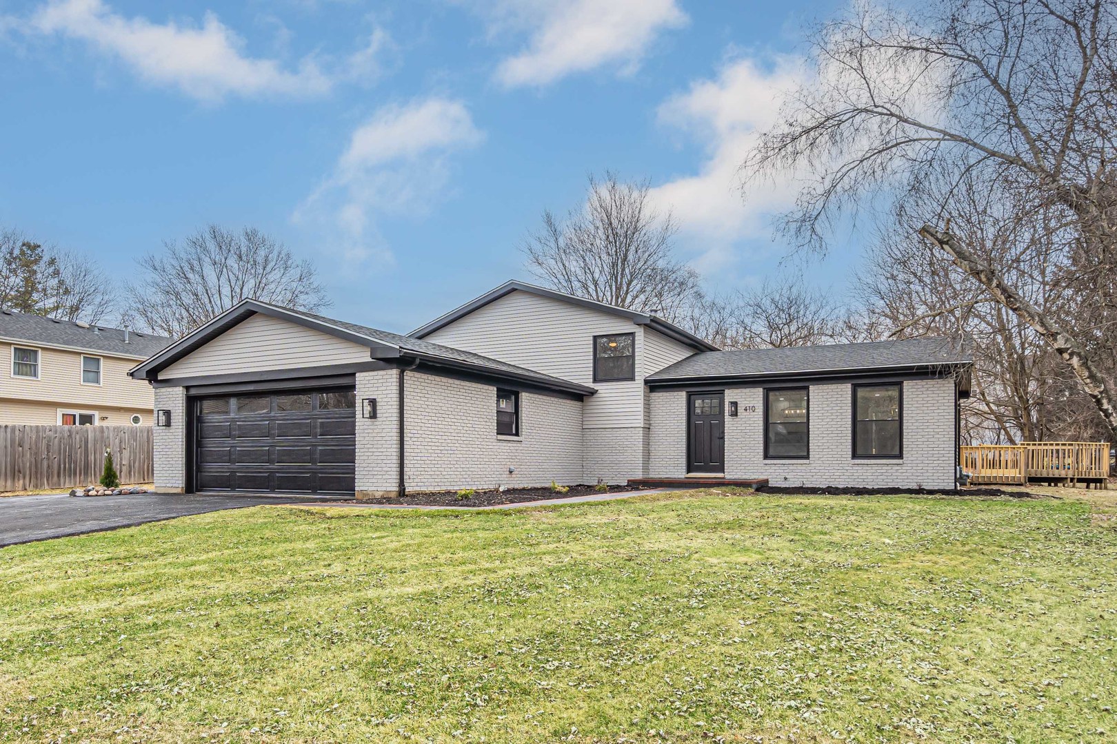 a house with trees in the background