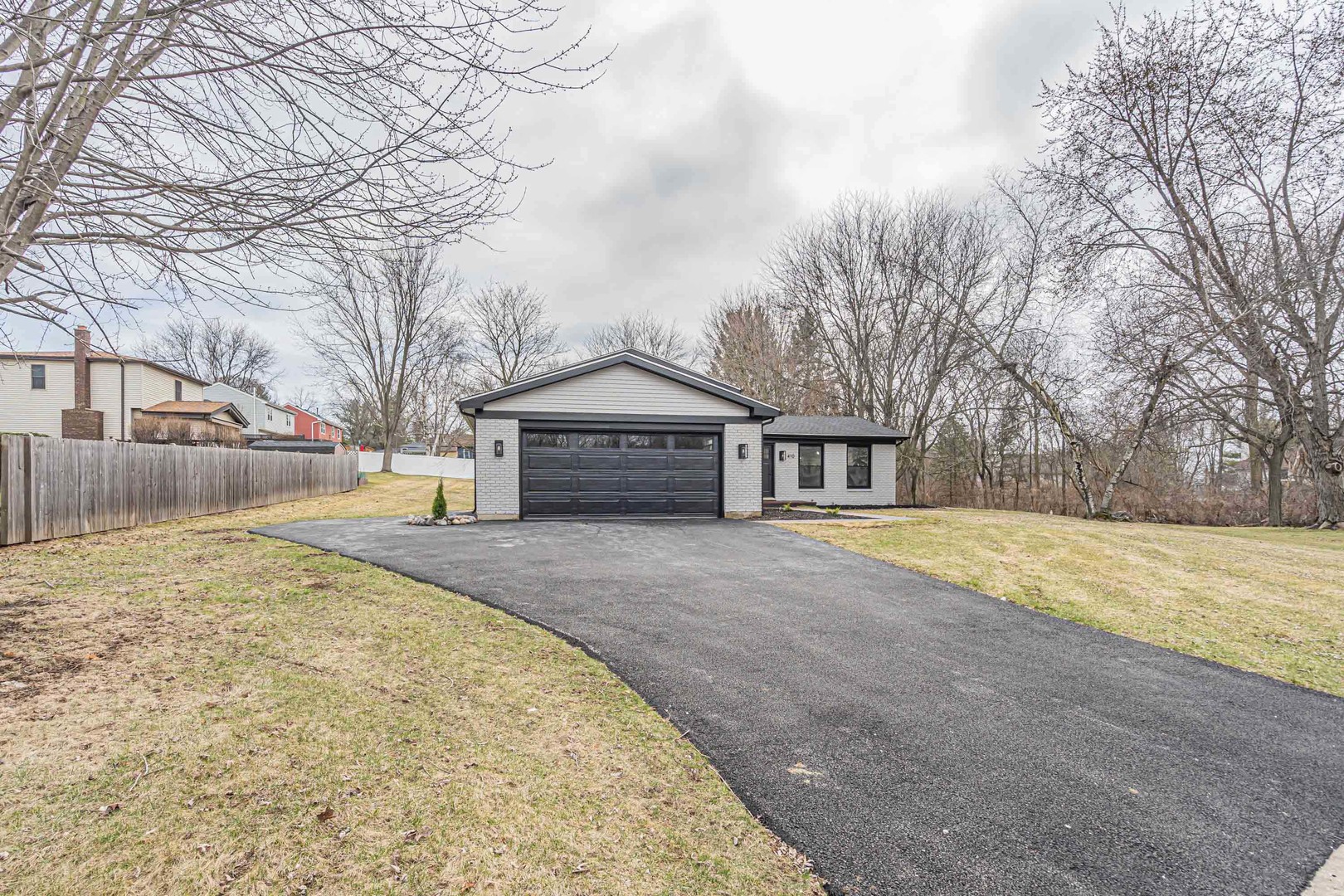 410 Kickapoo Avenue Batavia, IL 60510 - Photo 18 of 25 a house with trees in front of it