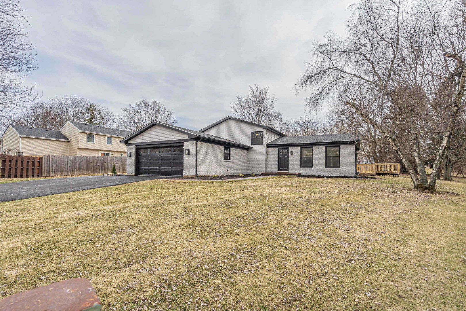 410 Kickapoo Avenue Batavia, IL 60510 - Photo 20 of 25 a house with trees in front of it