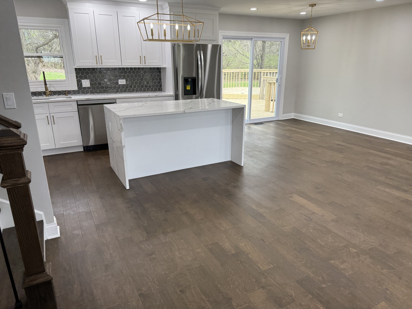 410 Kickapoo Avenue Batavia, IL 60510 - Photo 3 of 25 a kitchen with stainless steel appliances granite countertop a stove a sink and a granite counter tops with white cabinets