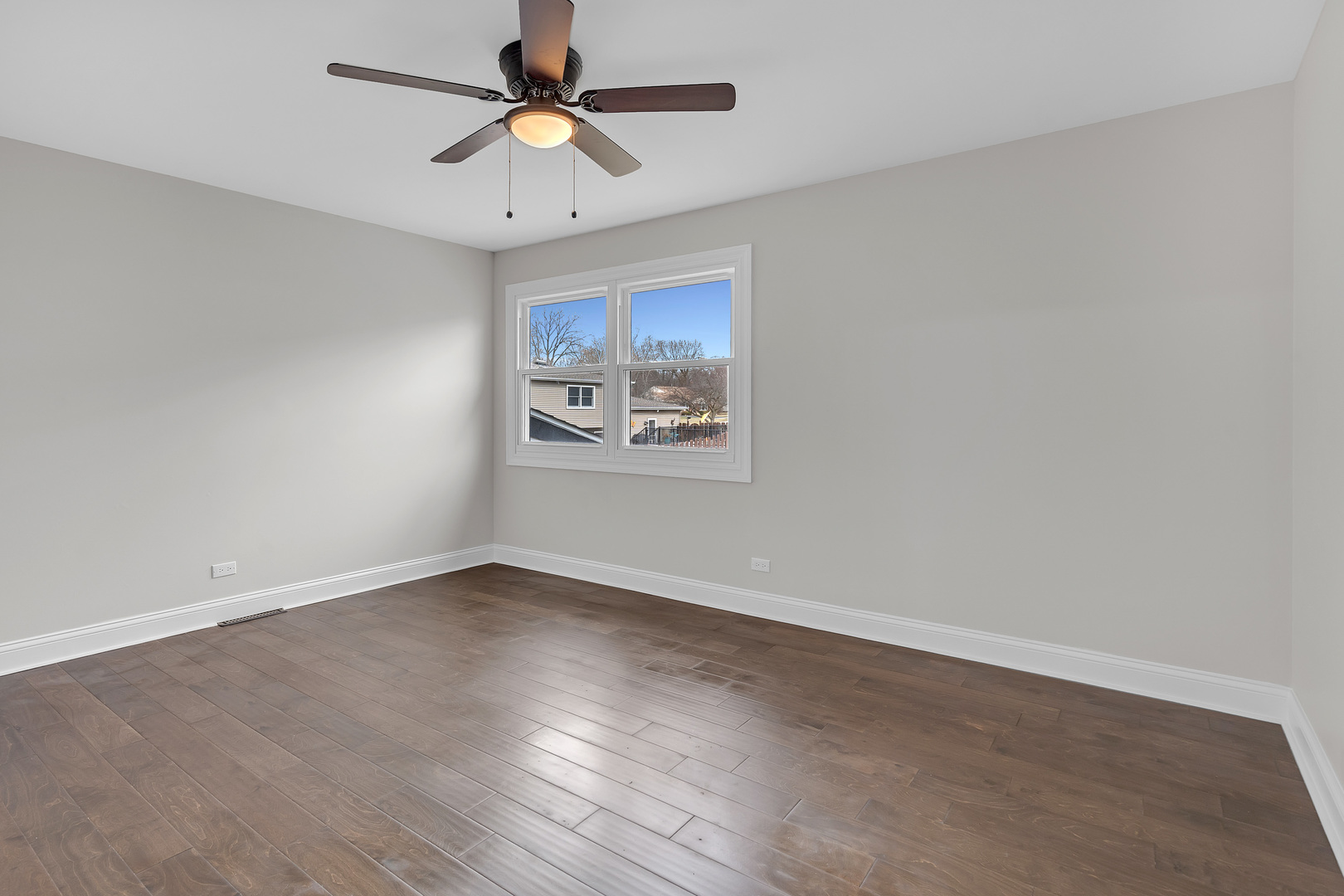 410 Kickapoo Avenue Batavia, IL 60510 - Photo 8 of 25 a view of an empty room with a window