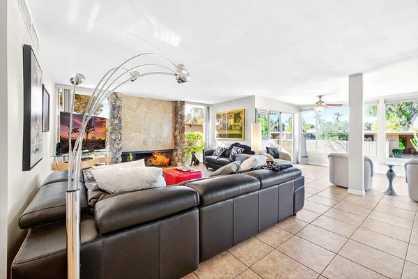 a view of a swimming pool with a patio