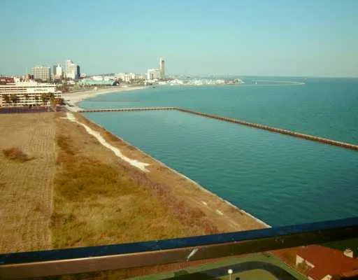 a view of a lake with a city