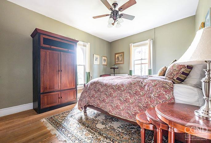 5 Willard Place Hudson, NY 12534 - Photo 13 of 26 a bedroom with a bed and a window