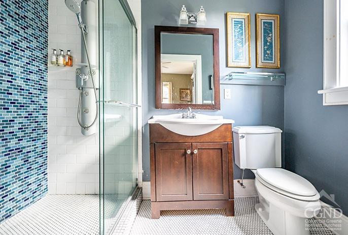 5 Willard Place Hudson, NY 12534 - Photo 14 of 26 a bathroom with a sink a toilet and shower