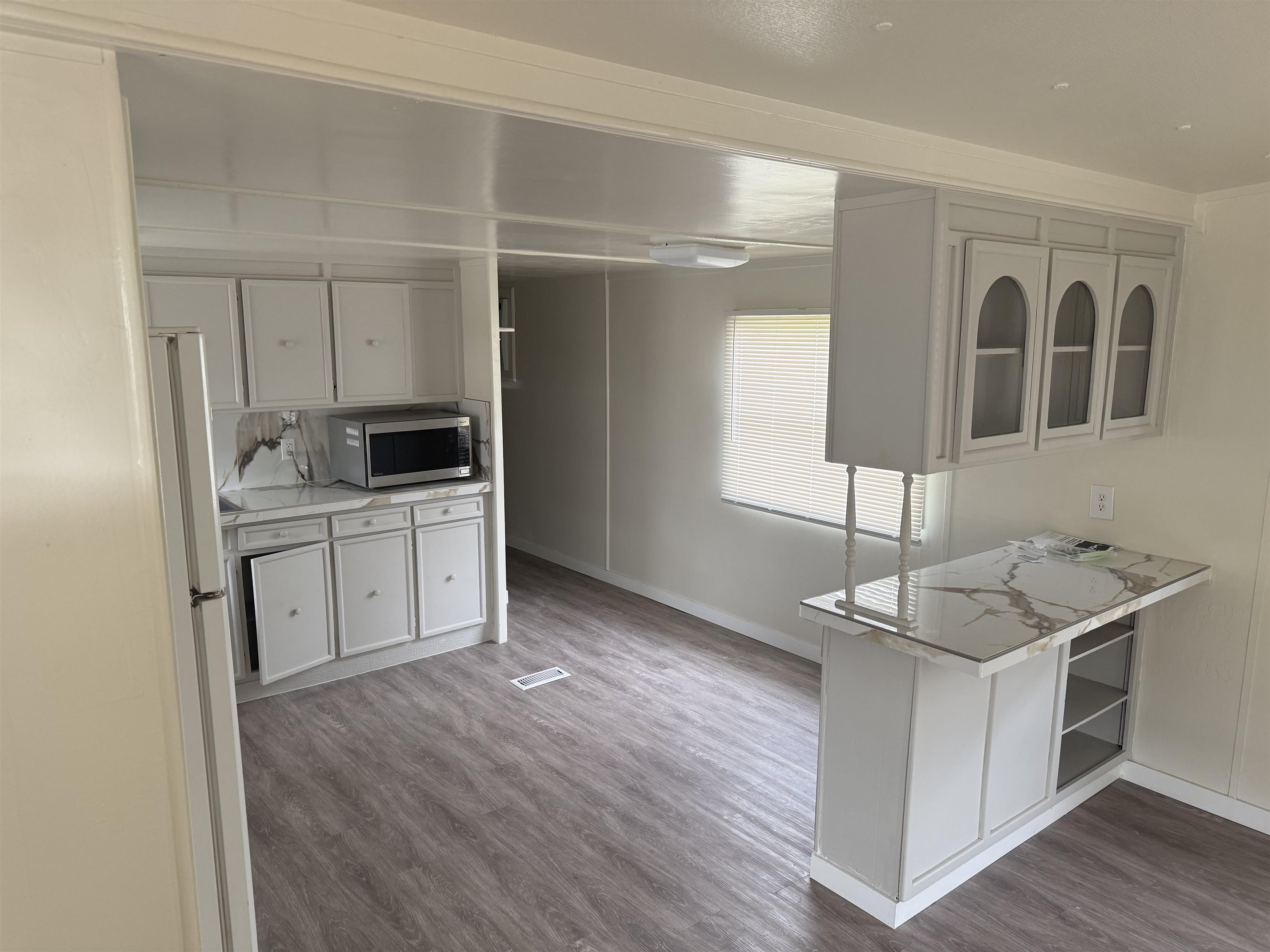585-25 25 1/2 Road, Unit 41 Grand Junction, CO 81505 - Photo 22 of 22 a kitchen with stainless steel appliances granite countertop a sink stove and cabinets