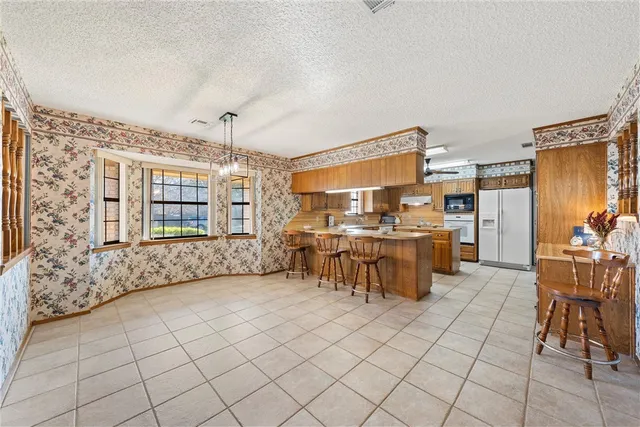 a view of a utility room with washer and dryer