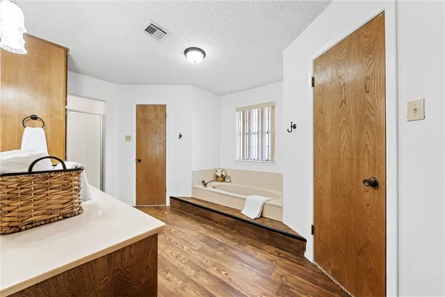 a view of room with a ceiling fan