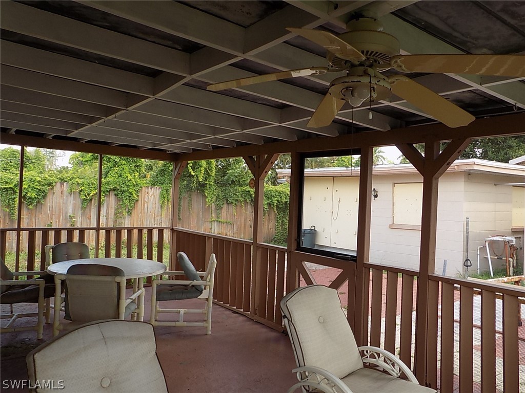 2105 Pineview Road Fort Myers, FL 33901 - Photo 17 of 22 a view of a chairs in wooden deck