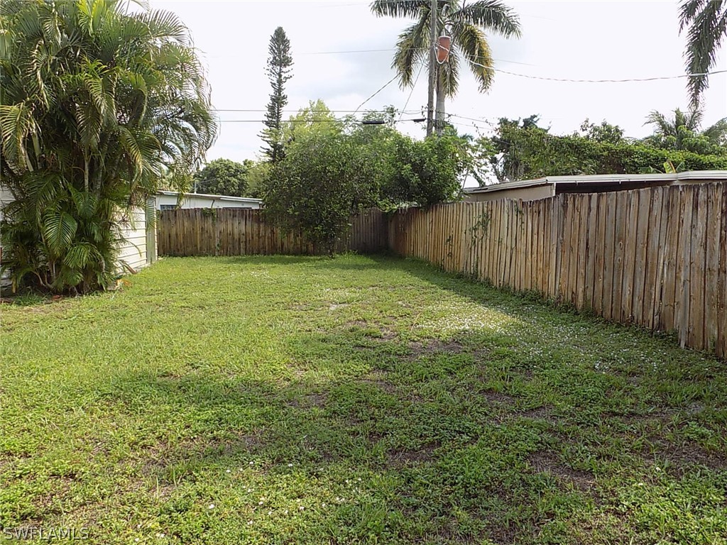 2105 Pineview Road Fort Myers, FL 33901 - Photo 21 of 22 a view of a backyard with a garden