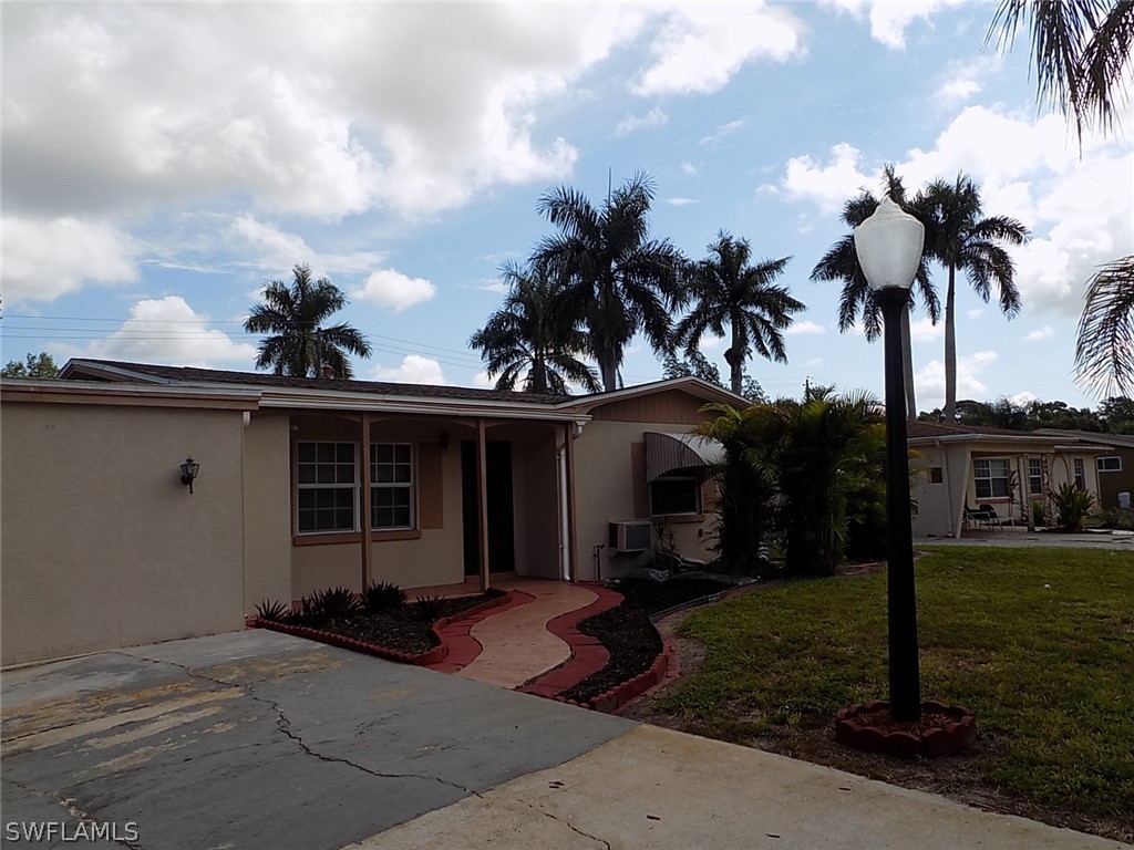 2105 Pineview Road Fort Myers, FL 33901 - Photo 5 of 22 a view of a house with backyard and garden