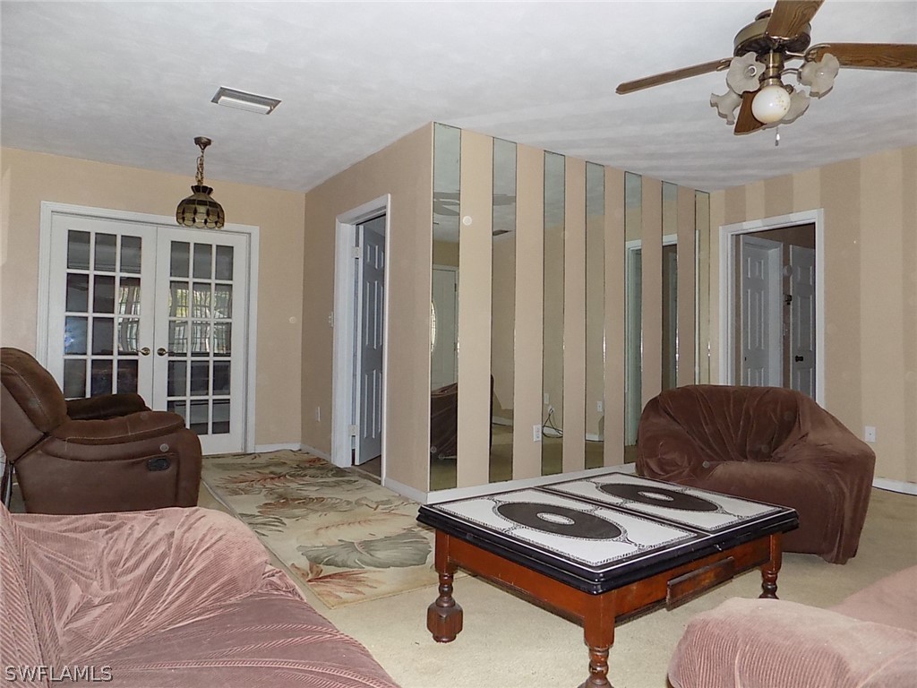 2105 Pineview Road Fort Myers, FL 33901 - Photo 6 of 22 a living room with furniture and a window